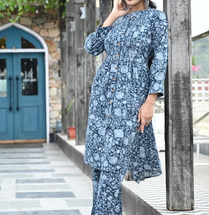 HK Vastra Gray Floral Co-ord Set for women. Dark gray button-down tunic with white floral pattern and matching pants. Stylish cotton fusion wear