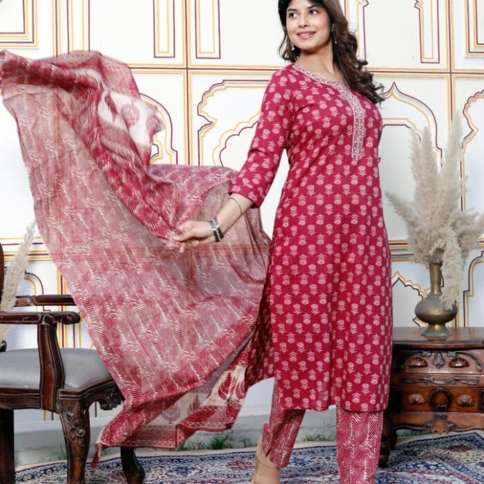 Woman wearing Maroon floral print cotton kurta set with zig-zag pattern dupatta and pants - Hk Vastra Ethnic Collection