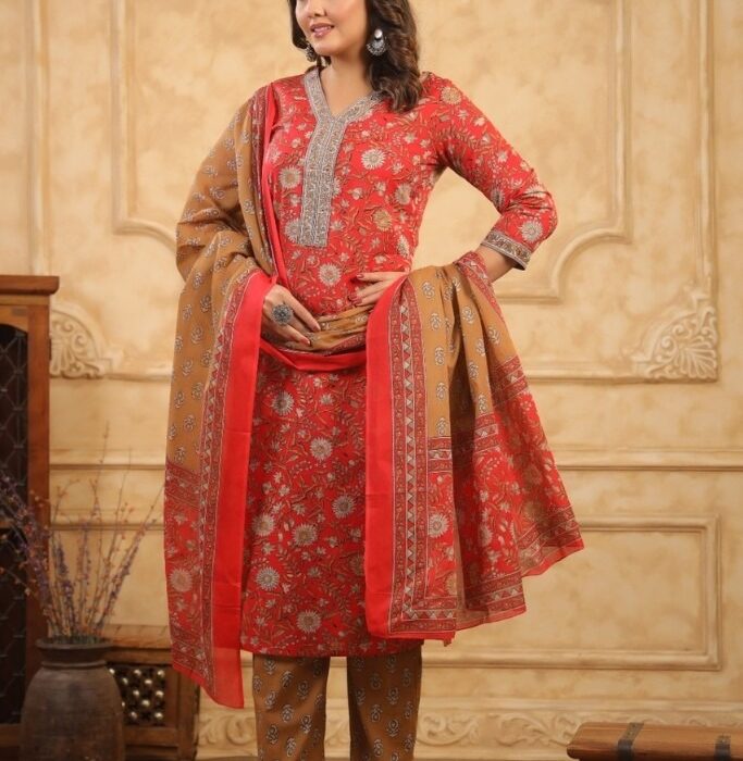 Red floral printed cotton kurta with mustard brown printed Pant and a matching dupatta by HK Vastra