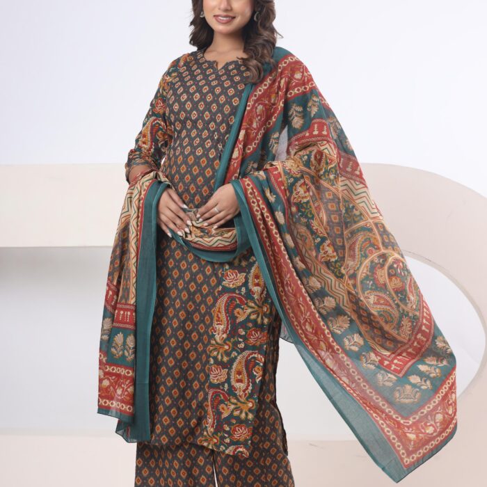 A woman wearing Green printed cotton kurti palazzo set with a matching patterned dupatta from Hk Vastra.
