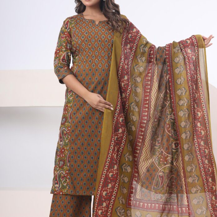 A model wearing a Mustard Printed cotton kurti palazzo set with a matching patterned dupatta from Hk Vastra.
