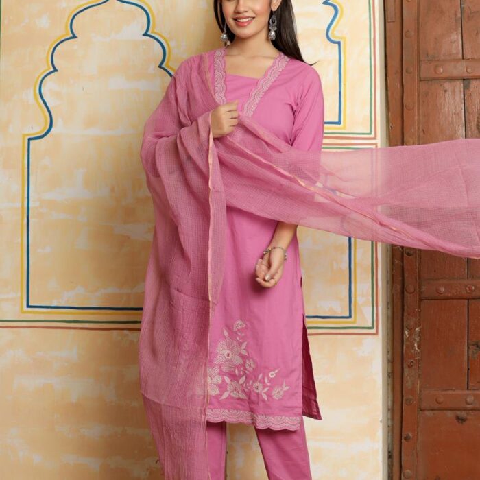 A woman posing in a vibrant pink ethnic suit with a matching Kota Doria dupatta, Vibrant Pink Embroidered Suit with Kota Doria Dupatta