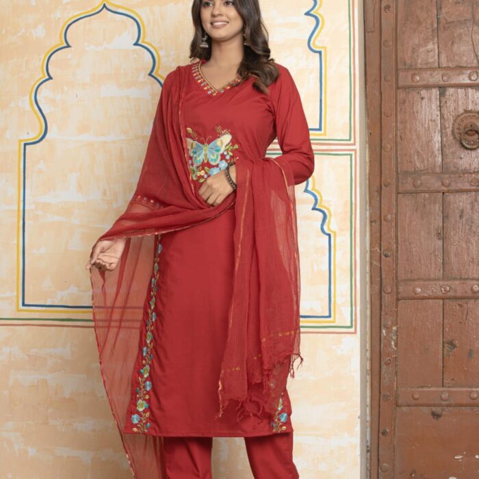 Red straight kurti with butterfly embroidery on the chest, matching red pants, and a sheer red Kota Doria dupatta from HK Vastra.