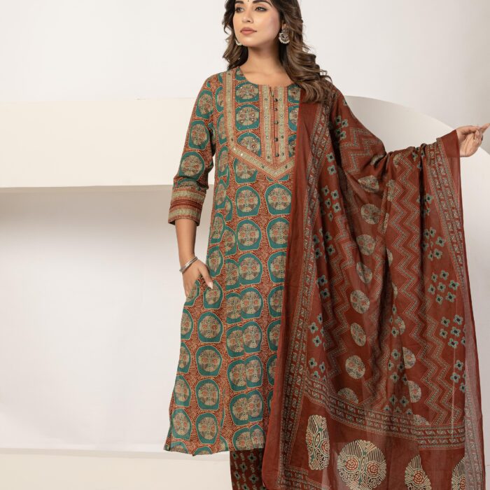 Model wearing a green and traditional block-printed A-line kurti with matching pants and a decorative dupatta from HK Vastra.
