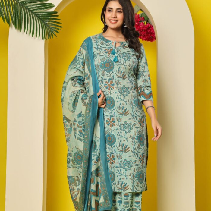 Model wearing a sky blue floral print cotton kurti with matching palazzo pants and dupatta set from HK Vastra.
