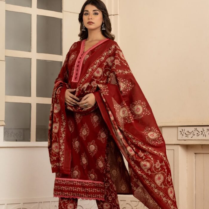 Maroon printed ethnic suit set with kurta, matching pants and dupatta, styled on a female model.