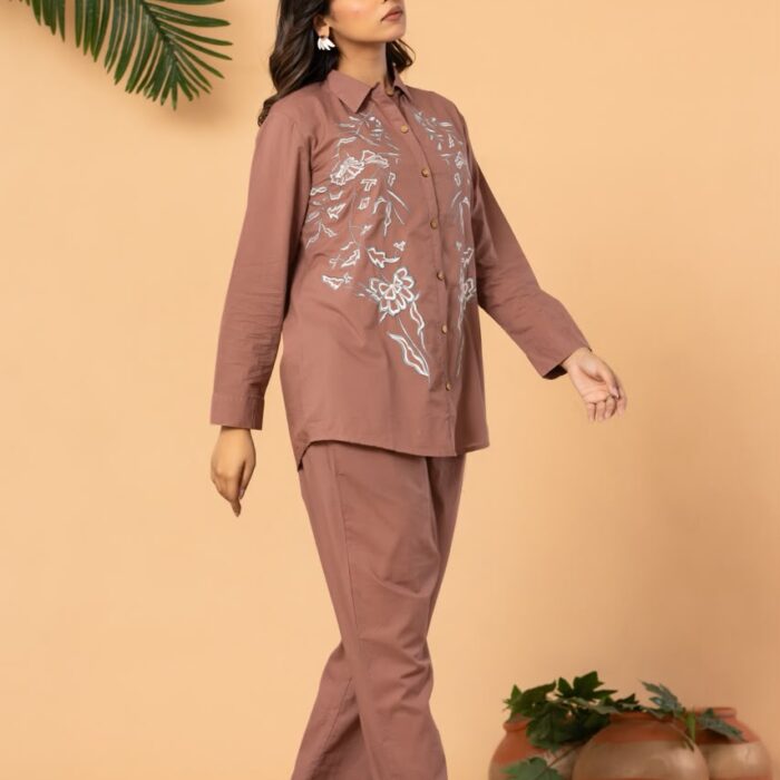 Peach floral embroidered co-ord set for women featuring a stylish full-sleeve top and matching pants.